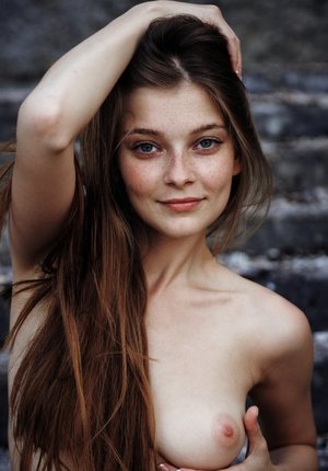 18 year old beauty Agnes takes great care in flaunting perky tits in the nude